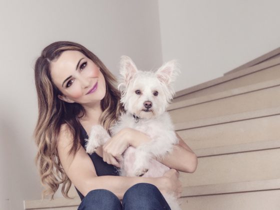 Shira Astrof of the Animal Rescue Mission with Terrier Dog